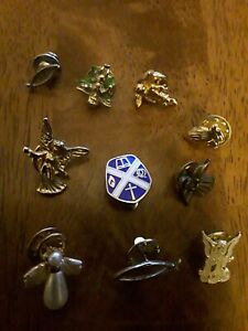 10 religious pins / tiepins
