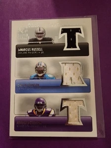 2007 SP Threads Calvin Johnson Adrian Peterson JaMarcus Russell Triple Jersey - Picture 1 of 12