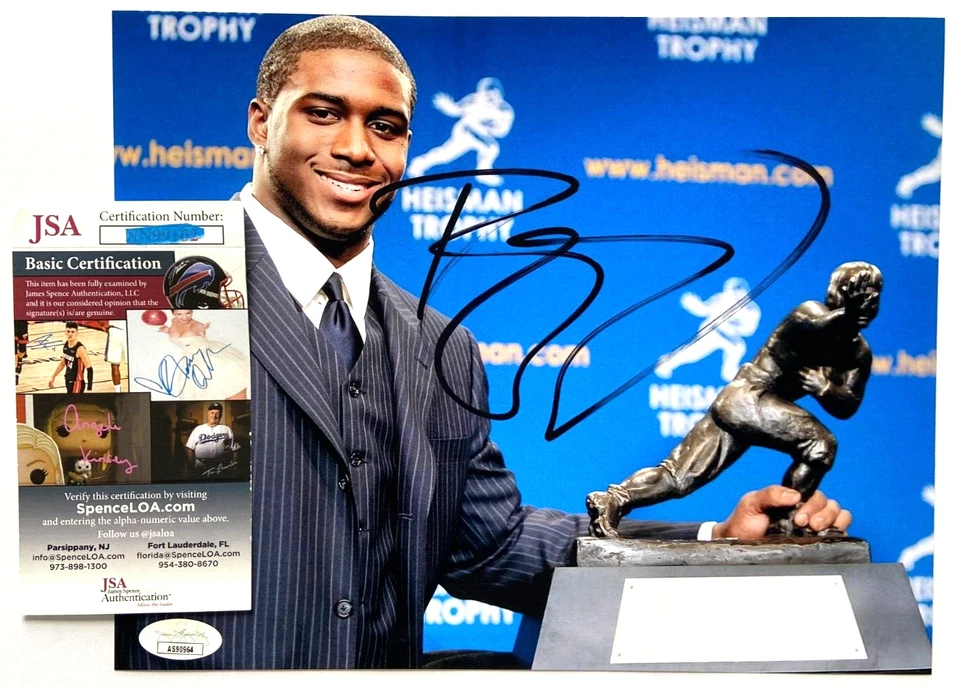 REGGIE BUSH SIGNED 8X10 PHOTO USC TROJANS HEISMAN TROPHY SAINTS NFL JSA - Изображение 1 из 1