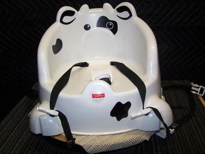 Silla elevadora con correas Fisher Price temática de vaca Foto 1 de 4