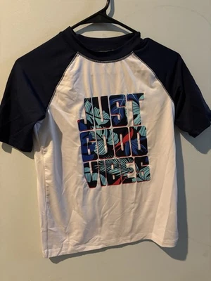 Protector contra erupciones Place Sport Boys Surf Life grande natación playa usado Foto 1 de 3