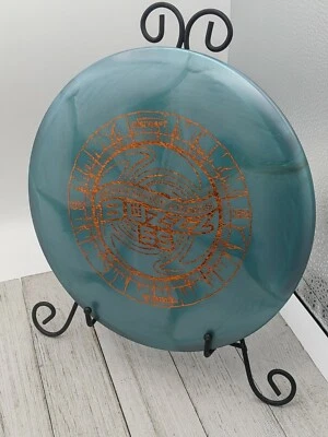 New Discraft Ledgestone 2022 Ti Swirl Buzzz SS Midrange Disc Golf Disc 177+ Gram - Image 1 of 4