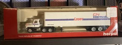 Remolque 1:87 HO HERPA PROMOX MACK TRACTOR 45' CN INTERMODAL LAZER RTR NUEVO EN CAJA Foto 1 de 4