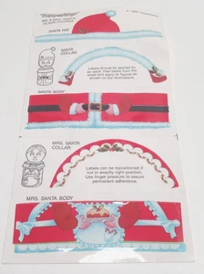 Hoja de pegatinas vintage de figuras de Papá Noel de Mr. & Mrs. Tupperware "Tuppertoy" - Imagen 1 de 7