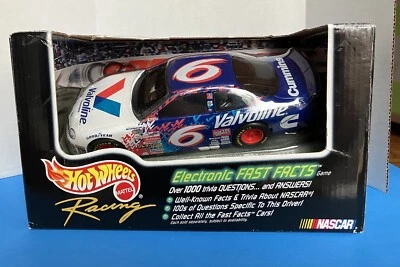 Coche de carreras Hot Wheels Racing NASCAR 1999 Ford Taurus con curiosidades electrónicas - funciona Foto 1 de 4