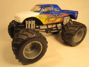 Camión de ruedas libres Bob Robins Team After Shock Monster Tuff escala 1:43 [Z211] - Imagen 1 de 5
