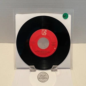 Conway Twitty – The Clown/The Boy Next Door Elektra – E-47302, 7" - Picture 1 of 2