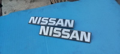 Nissan 720 Pickup Truck 1982-1996 OEM Chrome Side Fender LH RH Emblem Set USED  - Image 1 of 4