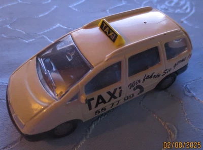Siku 1360 VW Sharan Taxi Wir fahren sie gern Antenne fehlt 1:55 Modellauto - Bild 1 von 3