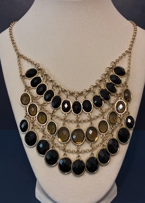 Collar llamativo multinivel tono dorado - cuentas ovaladas de cuarzo negro y ahumado Foto 1 de 4