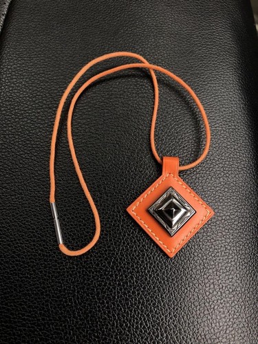 HERMÈS Collana Hermes Tuareg pelle arancione argento vintage ottima usata senza scatola
