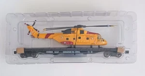 COCHE PLANO LARGO NACIONAL CANADIENSE MENARDS CON HELICÓPTERO GUARDACOSTAS CANADIENSE - Imagen 1 de 4