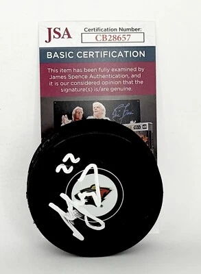 Marat Khusnutdinov signed Minnesota Wild Logo Puck autographed JSA - Image 1 of 2