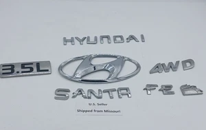 01 02 03 04 05 06 HYUNDAI SANTA FE V6 OEM REAR TAIL GATE CHROME EMBLEM LOGO - Bild 1 von 2
