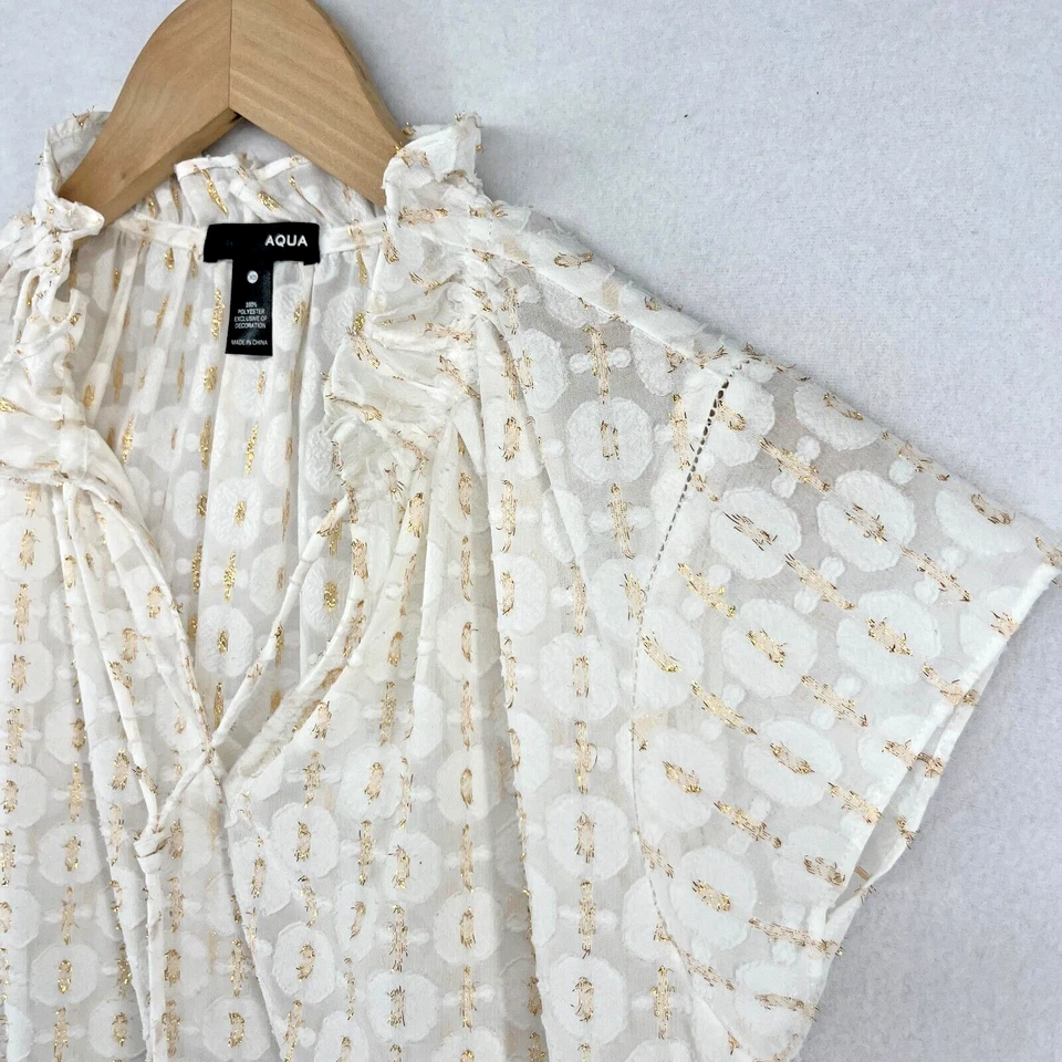 Blusa AQUA Top XS Jacquard Metálico Volantes Cuello Atado Geométrico Manga Gorra Blanca Foto 1 de 4