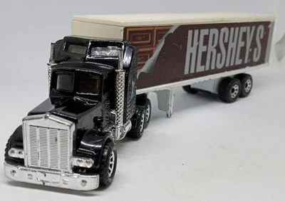 Литой под давлением трактор-прицеп Hershey's Loose Kenworth Aerodyne черный спичечный коробок 1:100 - Изображение 1 из 4
