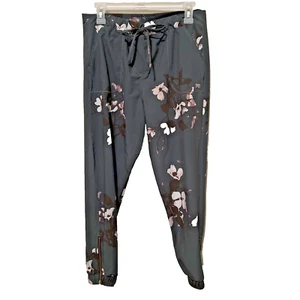 Albion Women's Sz S small Dogwood floral Jetsetter Jogger Pants olive Green zip - Picture 1 of 7