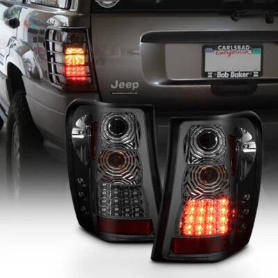 Smoked 1999 2000 2001 2002 2003 2004 Jeep Grand Cherokee LED Tail Lights - Image 1 of 4