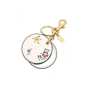 NUEVO CON ETIQUETAS NUEVO Bolso Coach Espejo Dije con Estampado de Prado Salvaje Espaciado Cuero Dorado/Tiza - Imagen 1 de 2