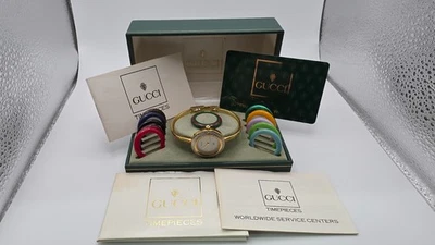 Reloj Gucci 1100L para dama con doce biseles intercambiables en caja y papeles Gucci Foto 1 de 4