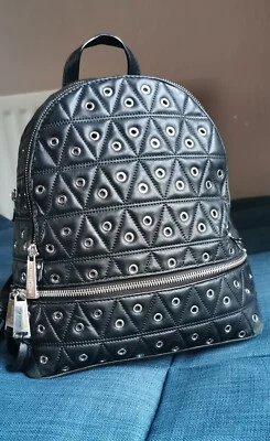 Mochila MK Michael Kors Rhea Quilte Ojales Tachonados. Negro. PVP £375 Foto 1 de 4