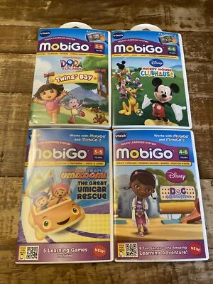Mobigo Games Lot Of 4 Mickey Mouse, Dora Twins Day, Team Umizoomi, Doc Mcstuffin - Image 1 of 4
