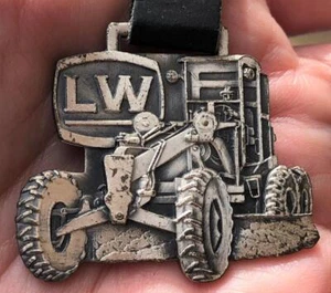 VINTAGE - LW LANGER EQUIPMENT COMPANY HIBBING MINNESOTA - WATCH FOB - Picture 1 of 1