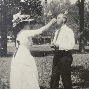 Antique RPPC Real Photograph Postcard Woman Feeding Man Silly Romantic Hat - Picture 1 of 4