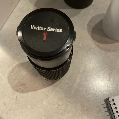 Vivitar Series VMC No. 37402688 Hoya Skylight (1A) 62 mm Lens W/ Dual Caps Zoom - Image 1 of 4