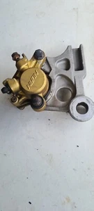 HONDA VTR1000 FIRESTORM 96-01 REAR BRAKE CALIPER AND HANGER RECENT PADS - Picture 1 of 4