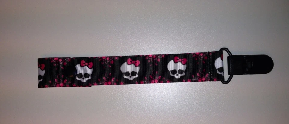 SUPER CUTE MONSTER HIGH SKULL PACIFIER HOLDER CLIP SNAP OR STRING - Image 1 of 1