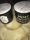 2 empty black candle jars with marble like lid