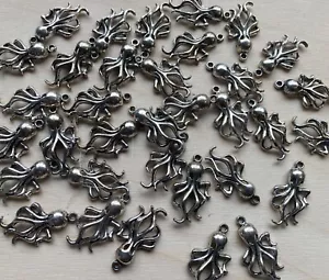 10 ciondoli polpo argento tibetano 10 x 30 mm perline artigianato perline all'ingrosso - Foto 1 di 3