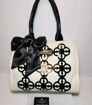 BOLSO DE MANO BRIGHTON MY FLAT IN LONDON ROYCETON CUADRADO BLANCO Y NEGRO LONA RECUBIERTA CUERO Foto 1 de 4