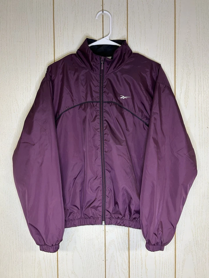Chaqueta cortavientos Reebok vintage talla mediana color ciruela púrpura Foto 1 de 4