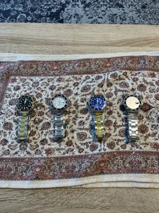4 hochwertige Herren-Armbanduhren in verschiedenen Farben – im Luxusdesign - Bild 1 von 1