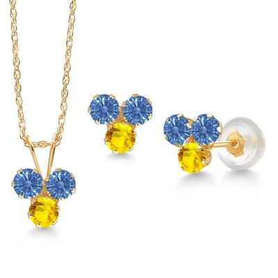 Elegante colgante de 3 piedras de oro amarillo de 14K con circonitas azules y zafiro amarillo Foto 1 de 3