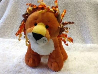 Cute Lion with Curly Ribbon Mane and Tail, 8" orange and white color  by Ganz - Image 1 of 4