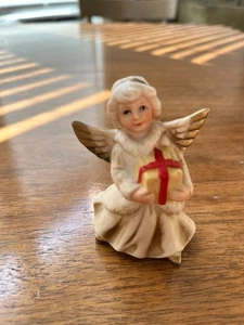 Ceramic Homco Angel Holding a Present figurine/ornament - Picture 1 of 5