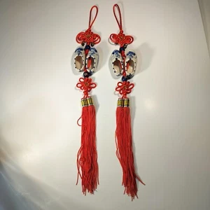 Pair of Chinese red pendant ornaments with decorative shoes - Picture 1 of 3