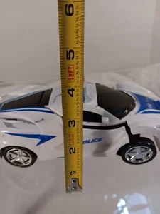 Transforming Police Car Robot Toy with Lights & Sounds – White Blue Action Vehic - Picture 1 of 13