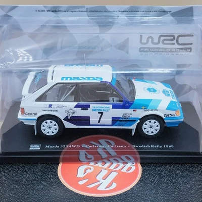 deagostini 1/24 Mazda 323 #7 4WD Carlsson Swedish Sweden Rally 1989 white blue - Image 1 of 4