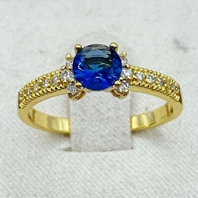 NEW  gold plated blue sapphire glass cocktail ring with clear side stones size 7 - Image 1 of 4