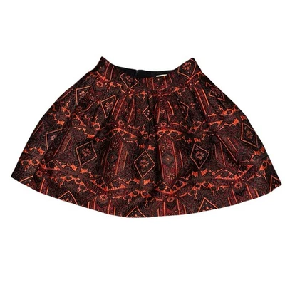 ALICE + OLIVIA Stora Tribal Print Pleated Mini Skirt Brocade Red Orange Black - Image 1 of 4