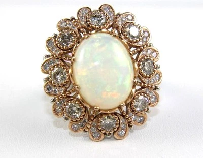 天然椭圆形火蛋白石和钻石光环单颗戒指 14k 玫瑰金 9.63 克拉 — 第 1/4 张图片