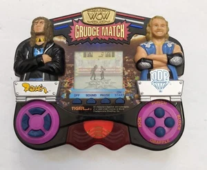 WCW NWO Tiger Premiere Electronic Handheld Game Grudge Match Raven VS DDP 1999 - Picture 1 of 2