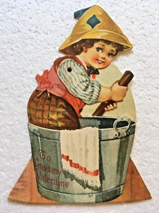 Tarjeta de San Valentín troquelada mecánica antigua niño lavar ropa batir mantequilla - Imagen 1 de 4