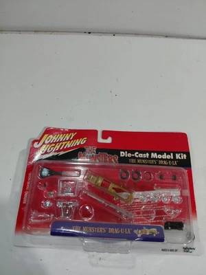 Kits de modelos fundidos a presión Johnny Lightning 1:64 The Munsters Drag-U-La Hot Rod Foto 1 de 4
