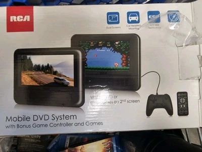 RCA DRC69705E28G 7" Mobile DVD System with Game Controller W Remote In Box Used. - Image 1 of 4