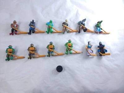 1990 Teenage Mutant Ninja Turtles Subterranean Sewer Hockey 12 Figures and Puck - Image 1 of 4